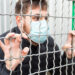 Italy quarantine, stop coronavirus. Italy coronavirus spreading outbreak. Novel coronavirus in Europe EU. Man in medical protective mask with Italian flag in cage. Stop virus epidemic. - Meteo: l’irruzione artica cambia rotta, il destino di novembre!