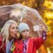 Happy girl taking selfie with mother at park during autumn - Ottobre finisce con caldo: Meteo, svolta verso il freddo a metà novembre