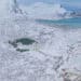 Aerial view of white snow mountain in Lofoten islands, Nordland county, Norway, Europe. Hills and trees, nature landscape in winter season. Top view. Pattern texture background. - Meteo: possibile affondo polare dalla Groenlandia verso mezza Europa e Italia?