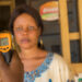 Close-up shot of a young african woman using infrared forehead thermometer (thermometer gun) to check her body temperature for virus symptoms – epidemic virus outbreak concept - Meteo: che altalena, la fine di novembre sarà sorprendente