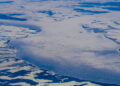 aerial photography from the height of the plane of the lake in the ice and fields in the snow - DIRETTA METEO, News Meteo, Previsioni Meteo, Viaggi