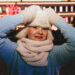 Winter night portrait of a beautiful woman in winter clothes. fur hat and mittens. - Meteo: Gelido in Russia, ma in Italia solo briciole