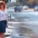 Portrait of red-haired happy woman in the rain - Meteo, l’anticiclone bloccato dalla palude gelida: serie conseguenze